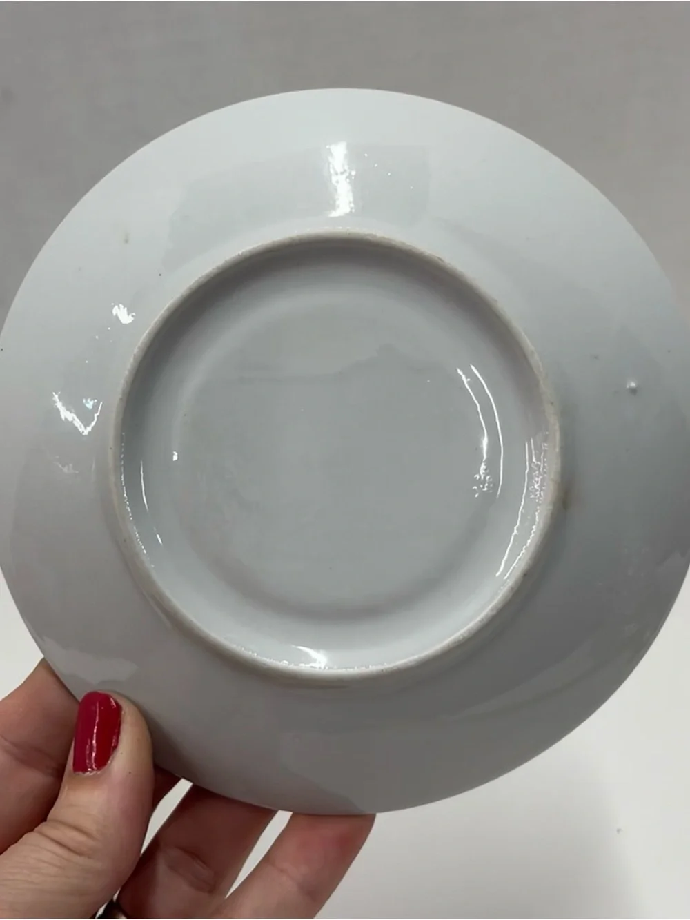Ceramic teacup and saucer